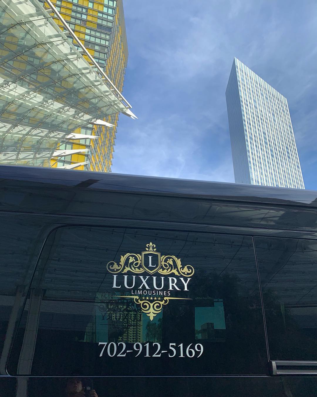 Luxury limousine driving along the Las Vegas Strip daytime private sightseeing tour